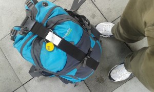 My backpack . just around 45 L , with a metal back support.   inside this, I have a small sling bag , for my camera , notebook, and other stuff i carry out.  As much as possible, both hands are free of anything =) i hate carrying more than one bag on long distances.