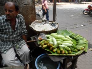 Indians eat sliced cucumber like ordinary fruit  as sold on the streets.