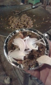 Mutton  Shawarma ( just the filling ) no pita . 40 INR ( less than 1 USD ) . I mixed this with my Biryani Rice. =) 