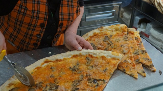 Pizza Slices are super huge at 3 Euro (150 pesos)